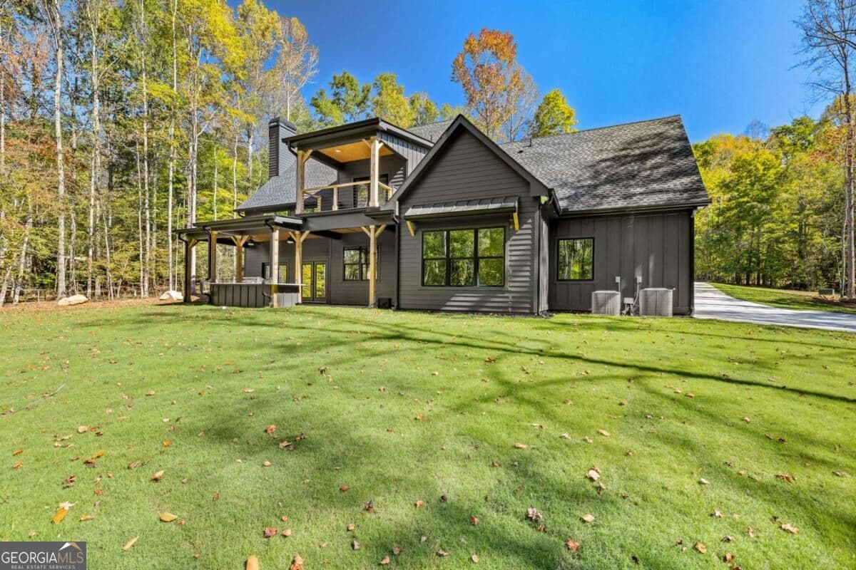 4 bedroom, 3.5 bathroom, 3,007 sq ft single family residence for sale at 389 Branch Drive, Pendergrass, GA 30567 — photo 4