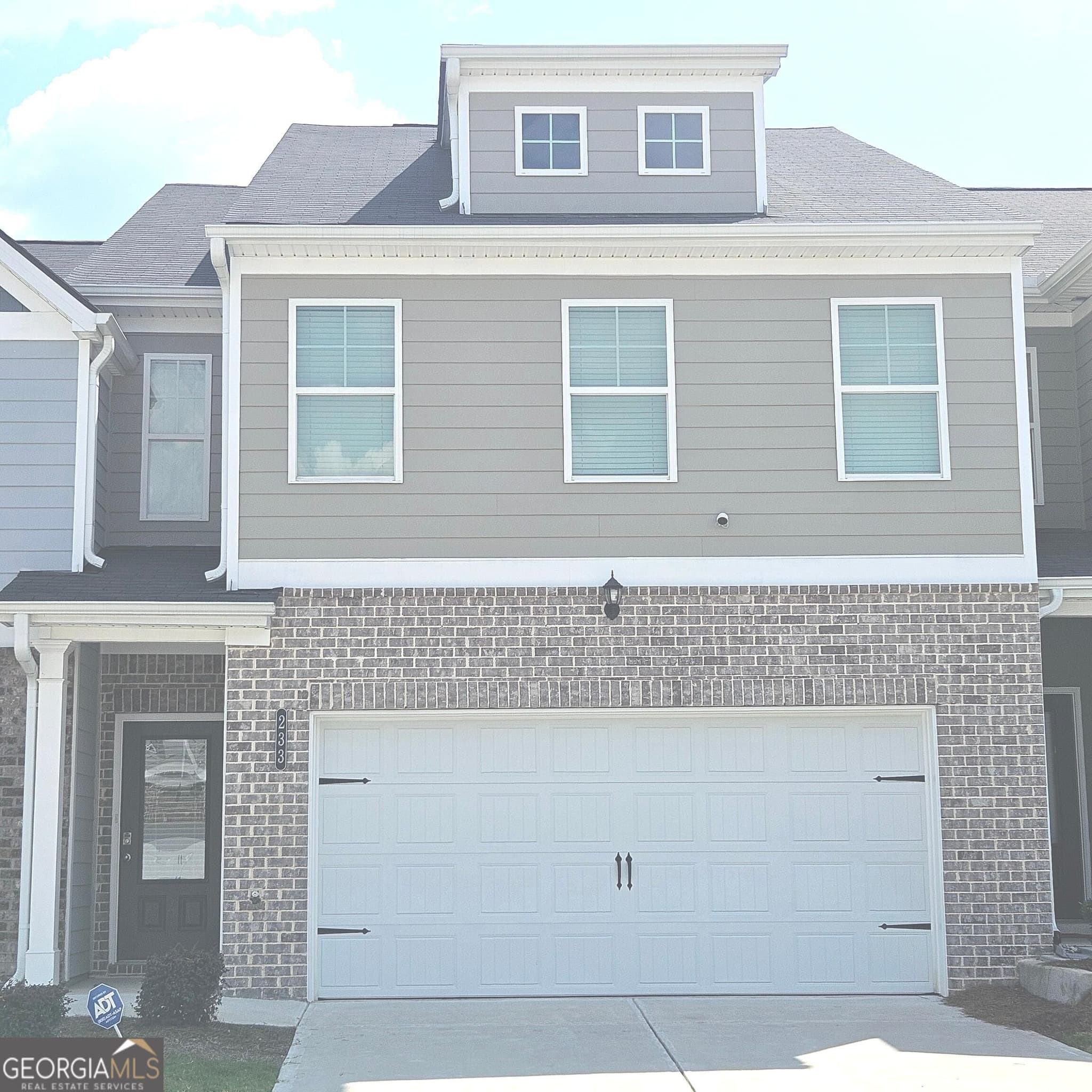 3 bedroom, 2.5 bathroom, 1,882 sq ft townhouse for sale at 233 Switcher Court, Union City, GA 30291 — photo 1 of 2