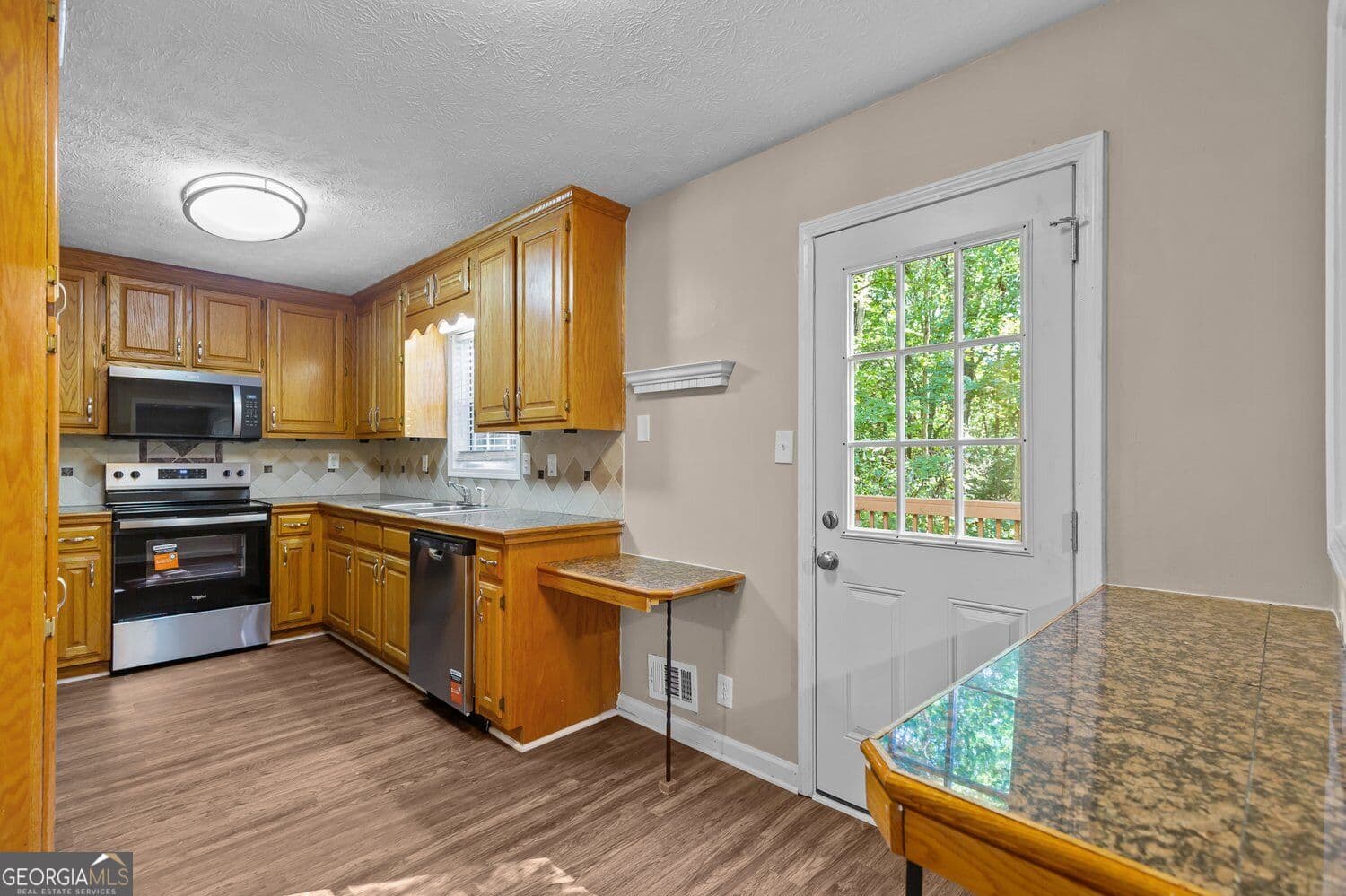 3 bedroom, 2.5 bathroom, 1,574 sq ft single family residence for sale at 424 Spring Falls Drive, Lawrenceville, GA 30045 — photo 10