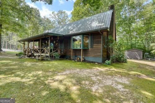 3 bedroom, 2 bathroom, 1,310 sq ft cabin,loft,single family residence for sale at 1026 Laurel Branch Road, Hayesville, NC 28904 — photo 6
