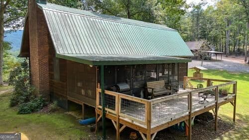 3 bedroom, 2 bathroom, 1,310 sq ft cabin,loft,single family residence for sale at 1026 Laurel Branch Road, Hayesville, NC 28904 — photo 5