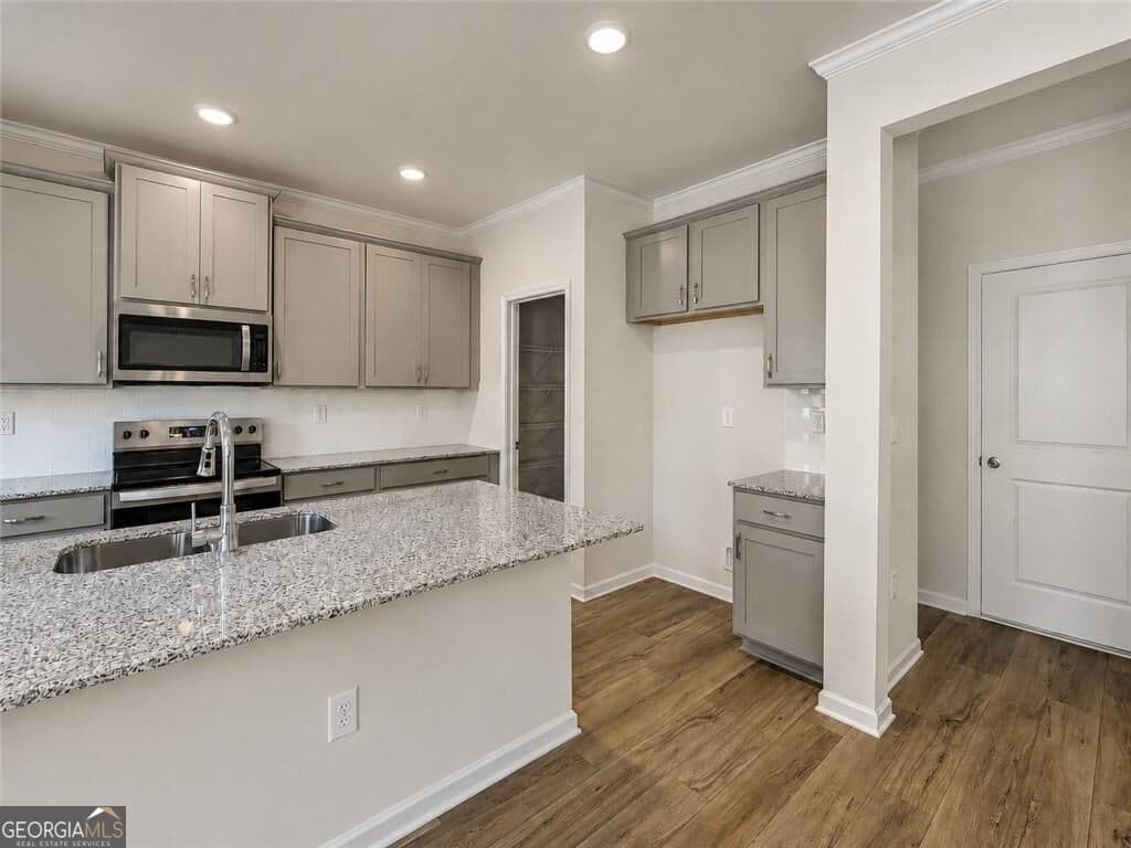 4 bedroom, 2.5 bathroom, 2,506 sq ft single family residence for sale at 3046 Steinbeck Way HOMESITE 27, Atlanta, GA 30344 — photo 5