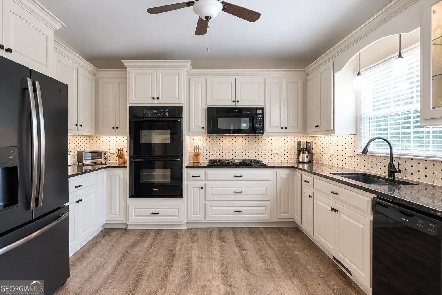 5 bedroom, 3.5 bathroom, 4,036 sq ft single family residence for sale at 4967 Reed Field Drive, Oakwood, GA 30566 — photo 3
