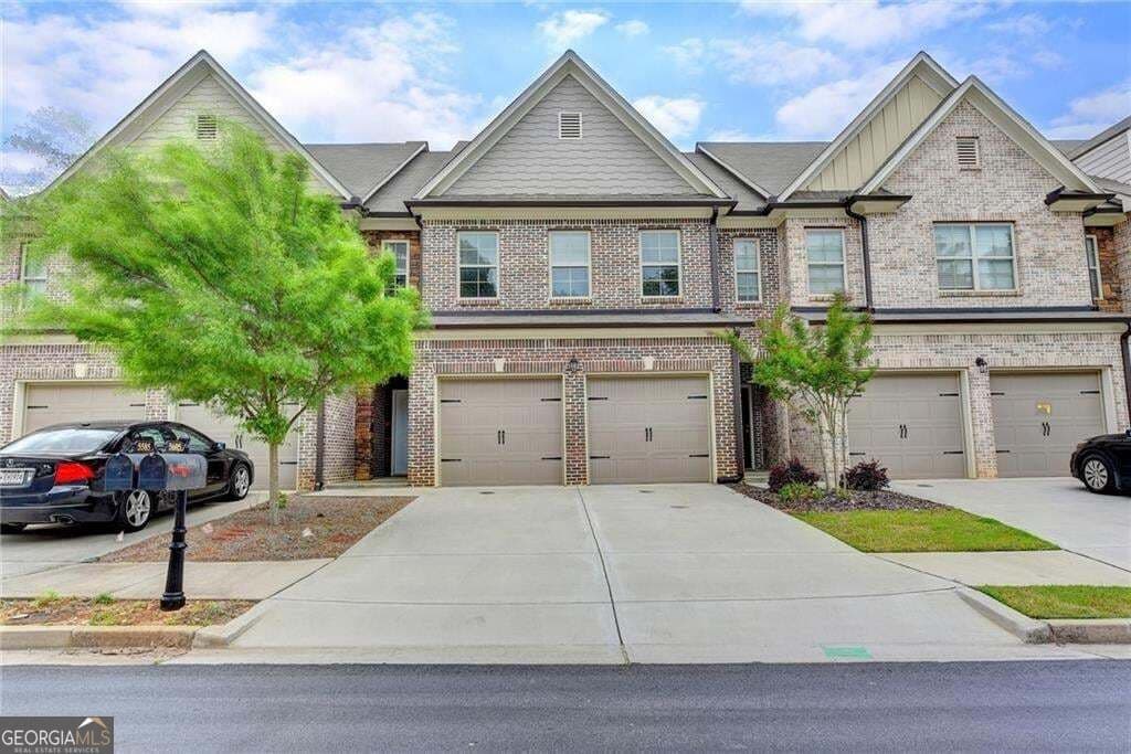 3 bedroom, 2.5 bathroom, 2,100 sq ft townhouse for rent at 5605 Bright Cross Way, Suwanee, GA 30024 for $2,500 a month — photo 1 of 52