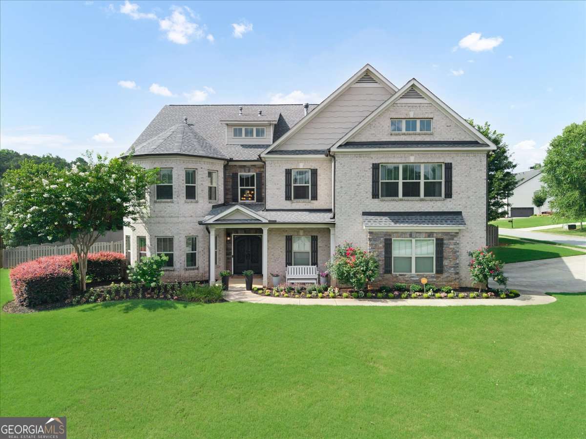 6 bedroom, 5 bathroom, 6,134 sq ft single family residence for sale at 2638 Cashel Lane, Powder Springs, GA 30127 — photo 2