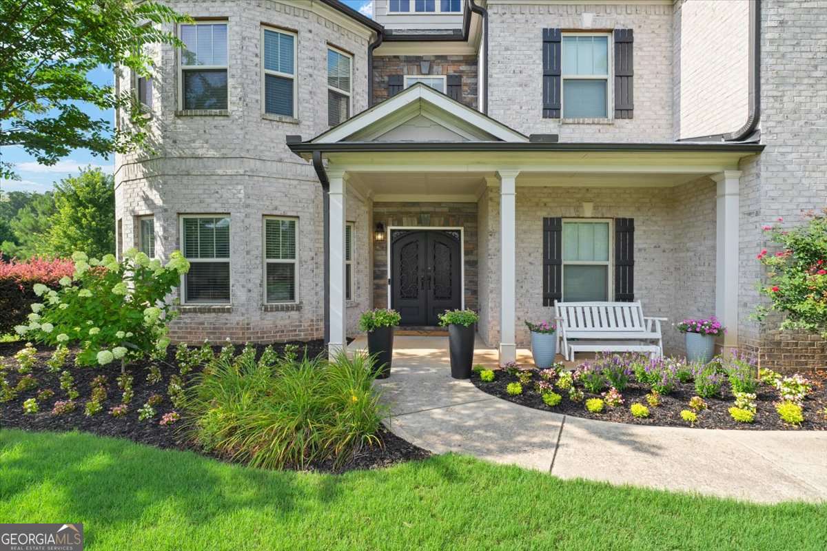 6 bedroom, 5 bathroom, 6,134 sq ft single family residence for sale at 2638 Cashel Lane, Powder Springs, GA 30127 — photo 3
