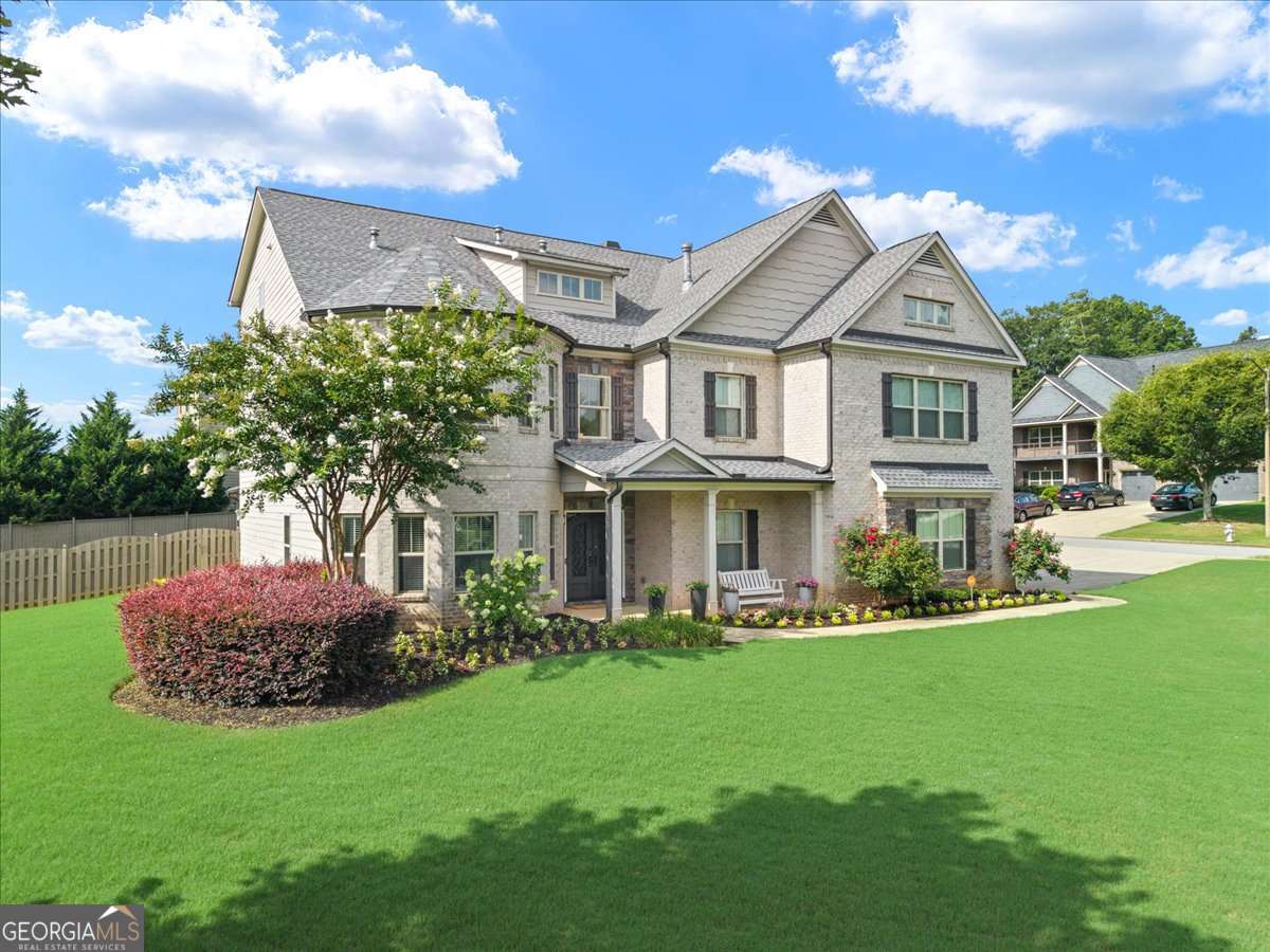 6 bedroom, 5 bathroom, 6,134 sq ft single family residence for sale at 2638 Cashel Lane, Powder Springs, GA 30127 — photo 1 of 82
