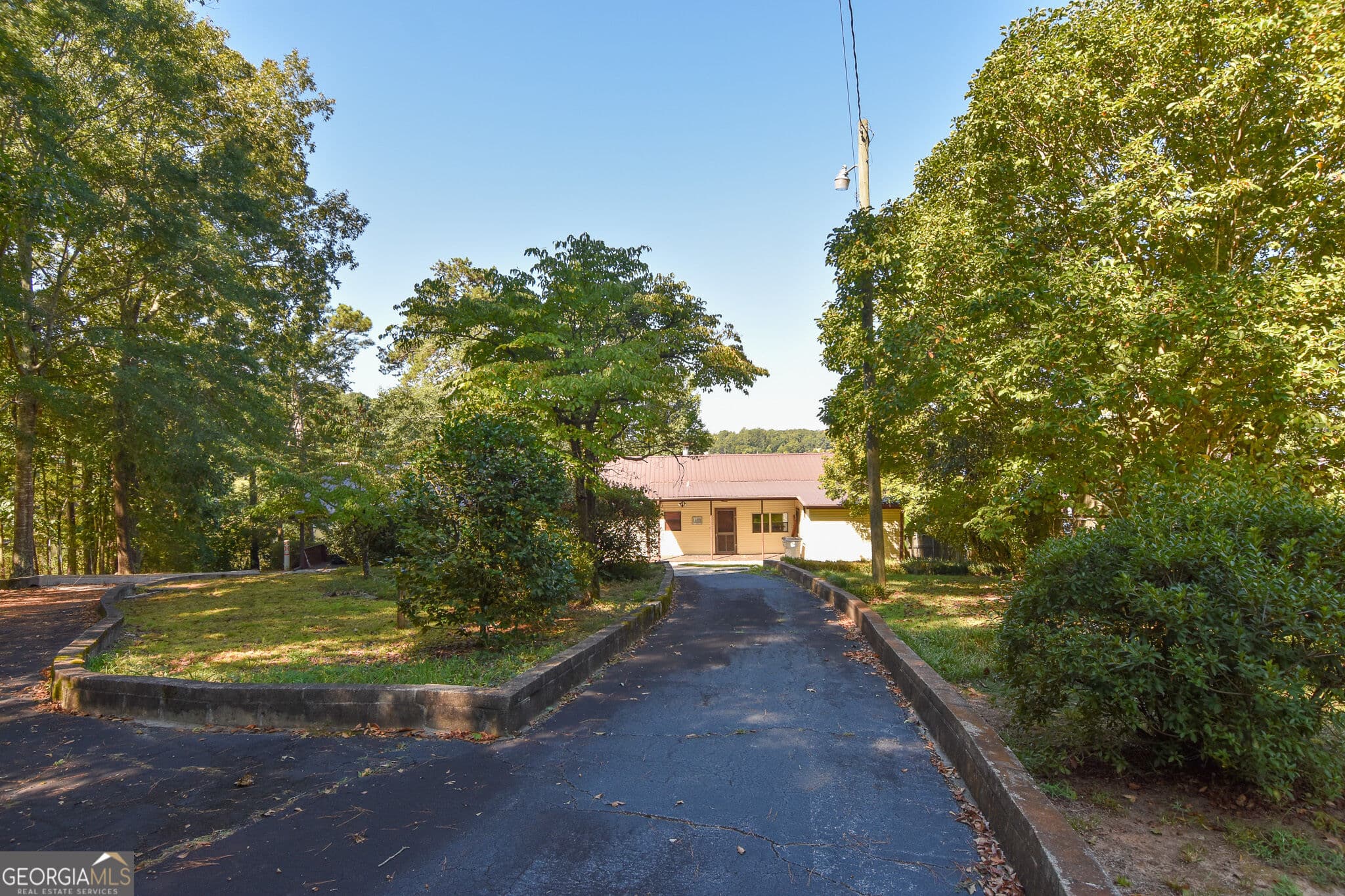 3 bedroom, 2 bathroom, 1,482 sq ft single family residence for sale at 411 Sandpiper Drive, Monticello, GA 31064 — photo 2