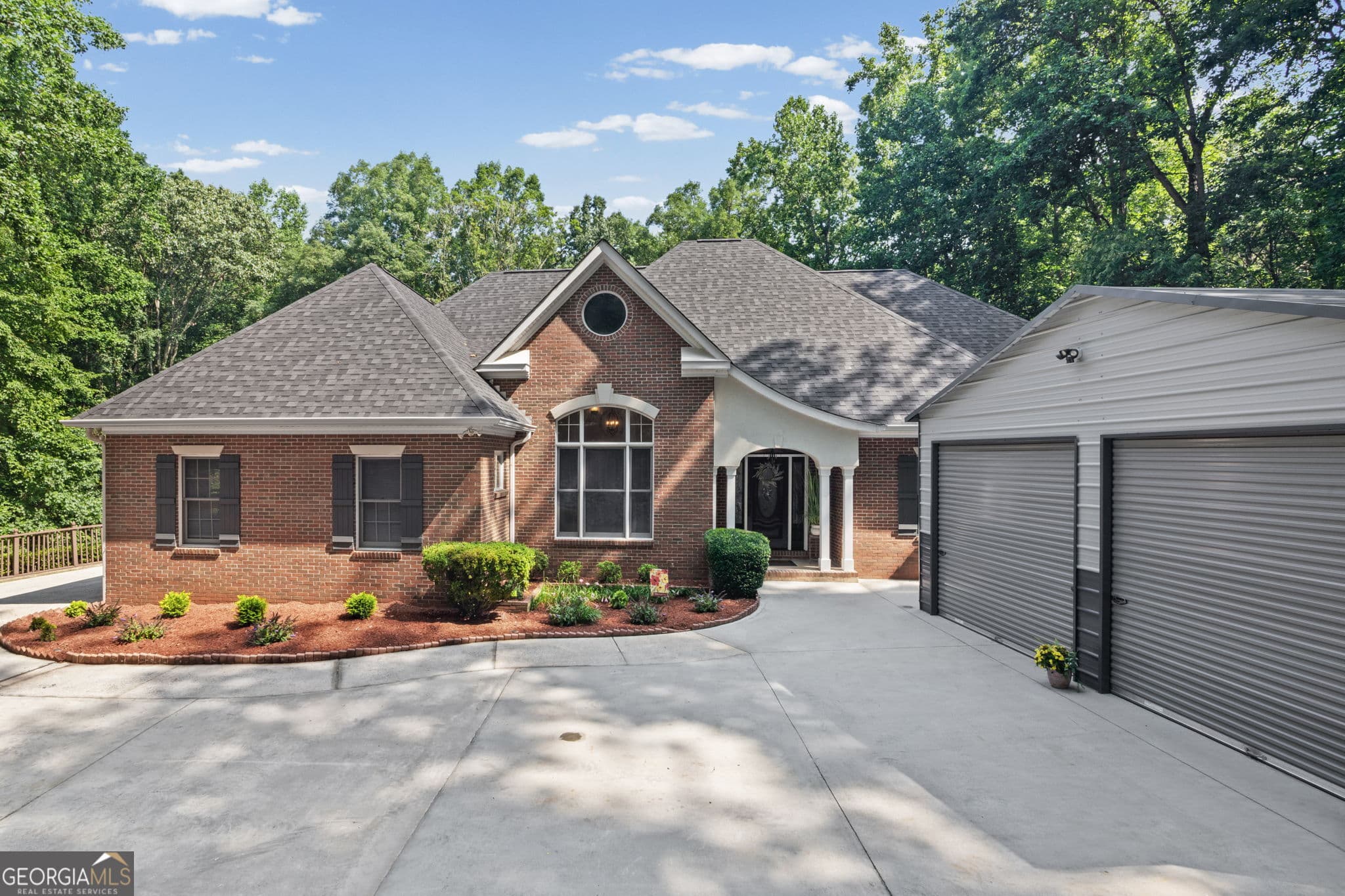 5 bedroom, 5 bathroom, 7,066 sq ft single family residence for sale at 75 Waters Edge Lane, Newnan, GA 30263 — photo 6