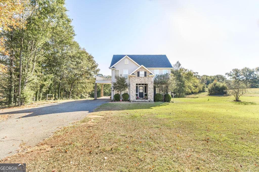 4 bedroom, 2.5 bathroom, 2,432 sq ft farm for sale at 1550 Charlie Benson Road, Forsyth, GA 31029 — photo 2
