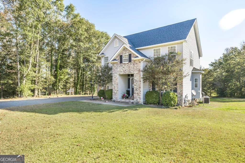 4 bedroom, 2.5 bathroom, 2,432 sq ft farm for sale at 1550 Charlie Benson Road, Forsyth, GA 31029 — photo 3