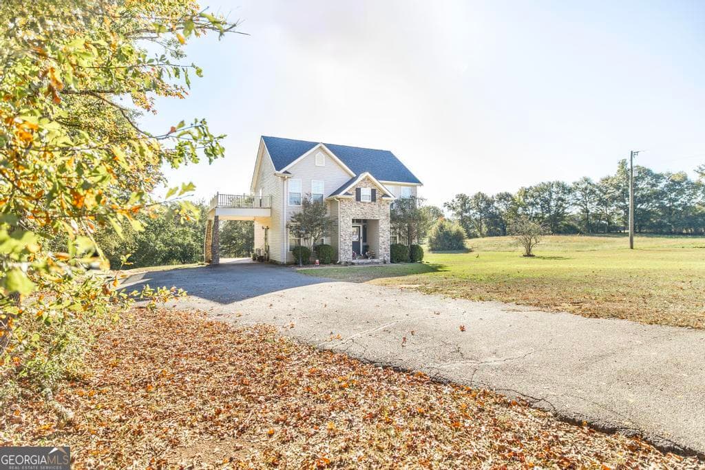 4 bedroom, 2.5 bathroom, 2,432 sq ft farm for sale at 1550 Charlie Benson Road, Forsyth, GA 31029 — photo 1 of 51