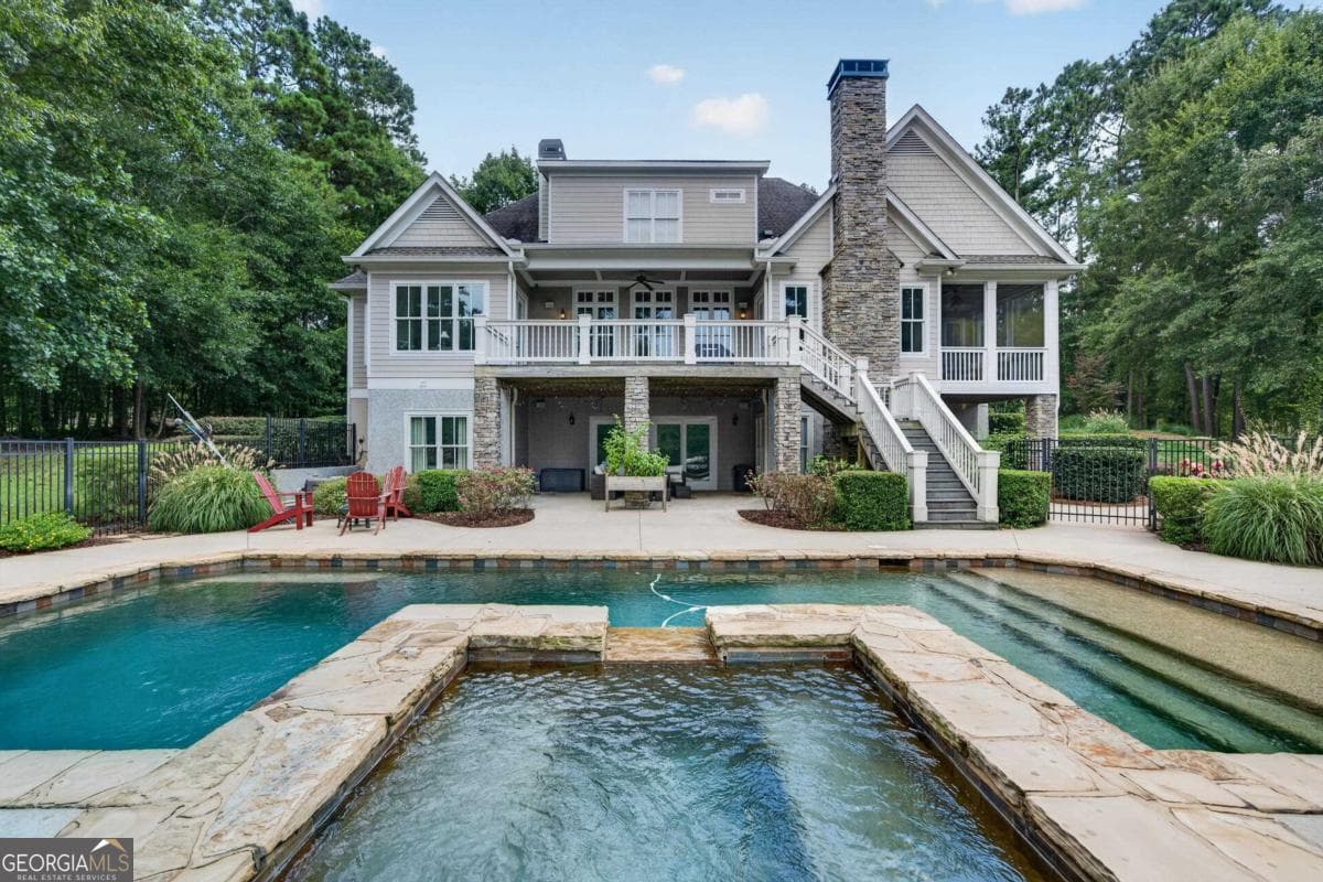 5 bedroom, 6 bathroom, 6,526 sq ft single family residence for sale at 132 Country Lane, Eatonton, GA 31024 — photo 2