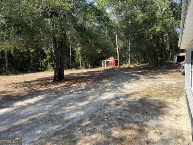3 bedroom, 2 bathroom, 1,344 sq ft manufactured home,single family residence for sale at 2635 Victoria Road, Metter, GA 30439 — photo 4