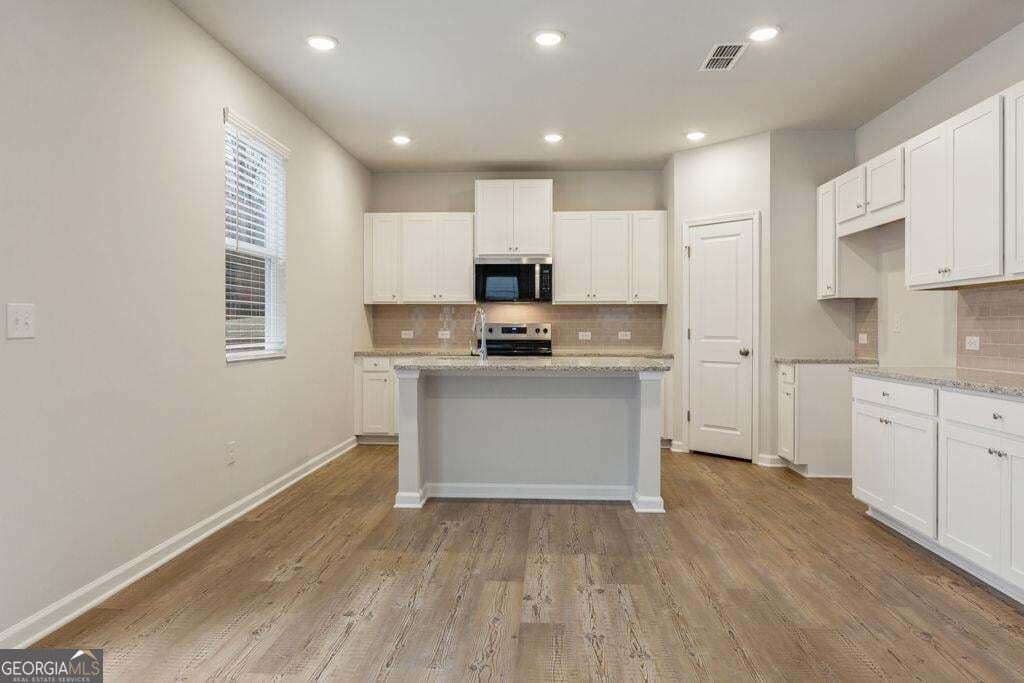4 bedroom, 4 bathroom, 2,343 sq ft single family residence for sale at 8047 Joyce Way, Fairburn, GA 30213 — photo 10