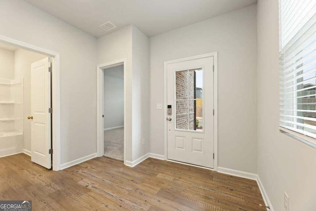 4 bedroom, 4 bathroom, 2,343 sq ft single family residence for sale at 8047 Joyce Way, Fairburn, GA 30213 — photo 4