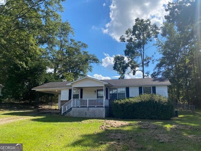3 bedroom, 2 bathroom, 1,066 sq ft single family residence for sale at 3022 36th Avenue, Lanett, AL 36863 — photo 2