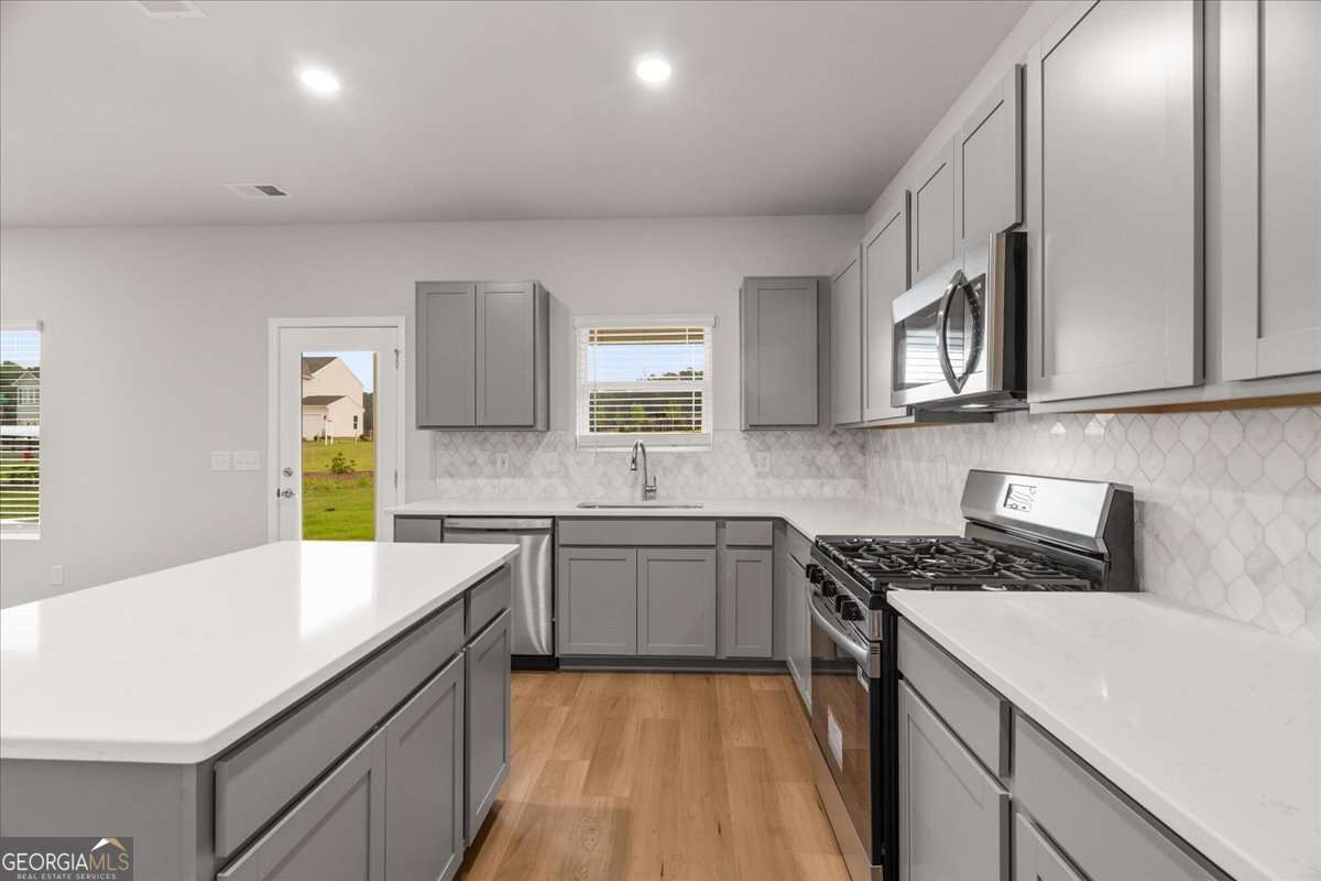 5 bedroom, 3.5 bathroom single family residence for sale at 100 Wildflower Circle, Calhoun, GA 30701 — photo 3