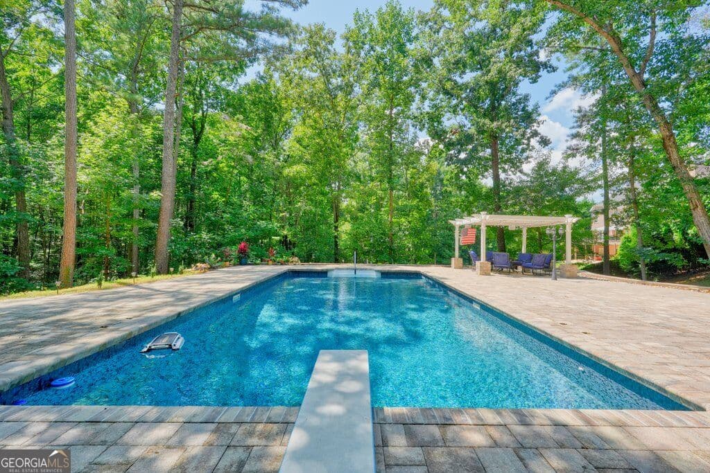 5 bedroom, 6 bathroom, 6,546 sq ft single family residence for sale at 110 Ridge View Drive, Ball Ground, GA 30107 — photo 4