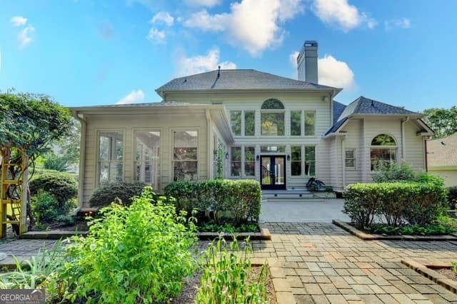 5 bedroom, 4 bathroom, 5,382 sq ft single family residence for sale at 7735 Little Aston Way, Duluth, GA 30097 — photo 3