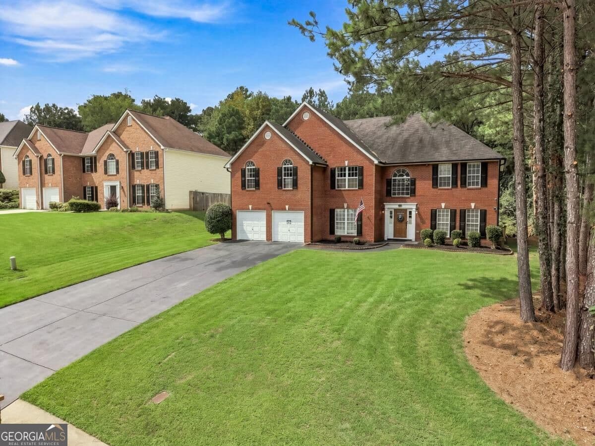 5 bedroom, 3.5 bathroom, 3,415 sq ft single family residence for sale at 305 Paper Mill Drive, Lawrenceville, GA 30046 — photo 4