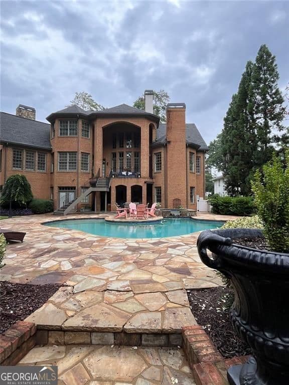6 bedroom, 6.5 bathroom, 8,695 sq ft single family residence for sale at 280 Old Ivy Road, Atlanta, GA 30342 — photo 2