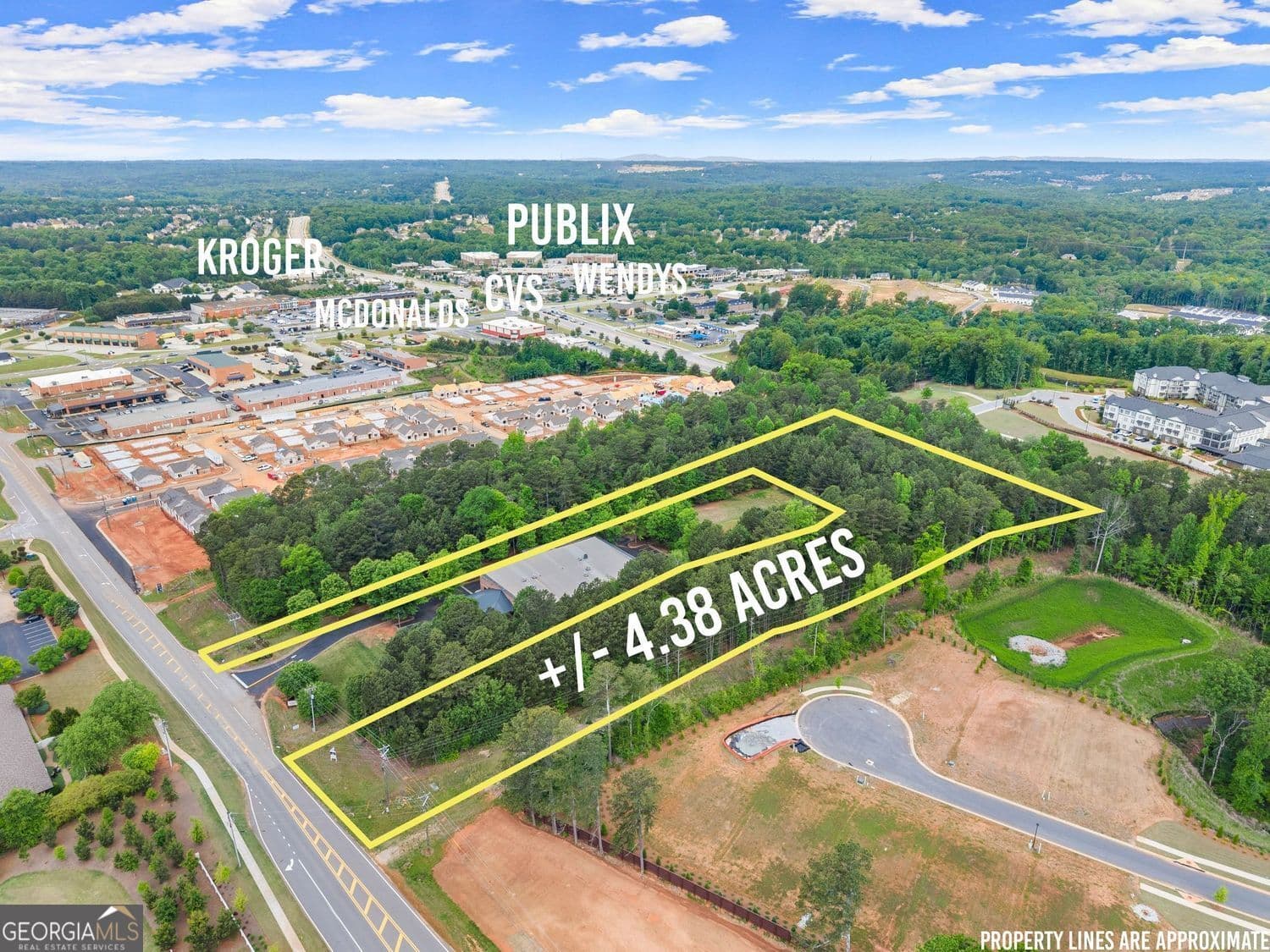 unimproved land for sale at 5378 Thompson Mill Road, Hoschton, GA 30548 — photo 1 of 30