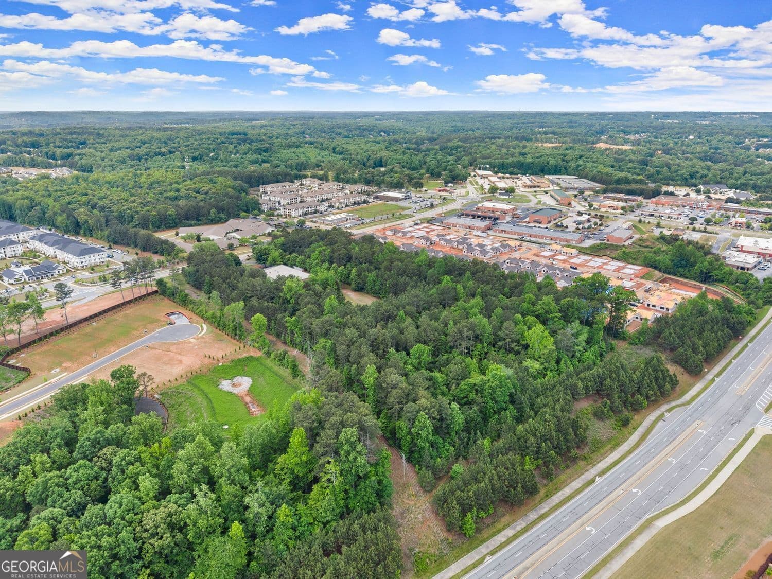 unimproved land for sale at 5378 Thompson Mill Road, Hoschton, GA 30548 — photo 5