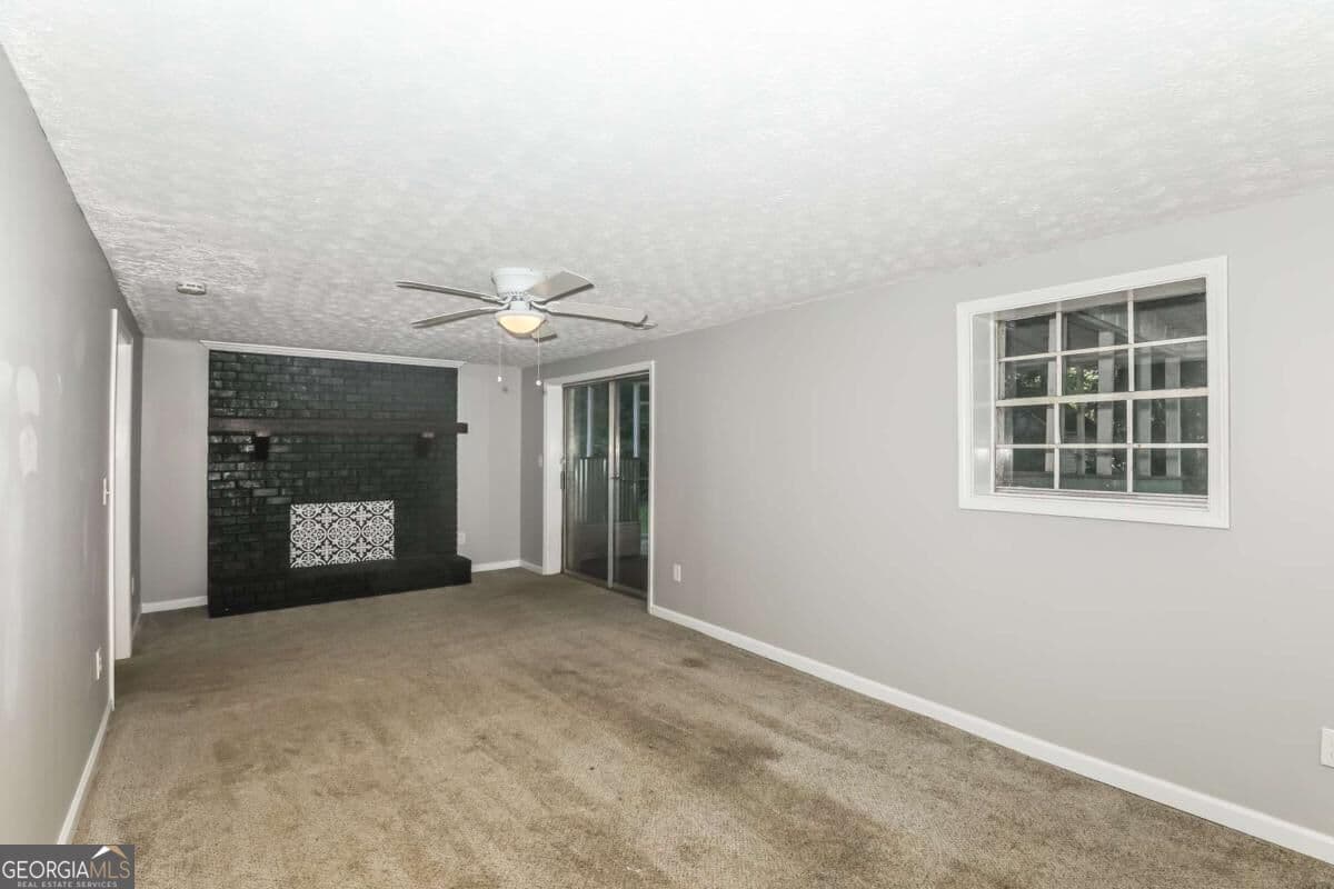 4 bedroom, 2.5 bathroom, 2,352 sq ft single family residence for sale at 2734 Noahs Ark Road, Jonesboro, GA 30236 — photo 2