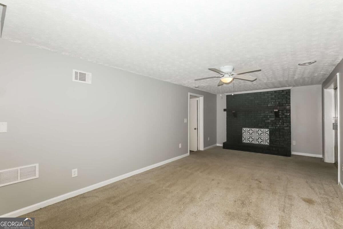 4 bedroom, 2.5 bathroom, 2,352 sq ft single family residence for sale at 2734 Noahs Ark Road, Jonesboro, GA 30236 — photo 3