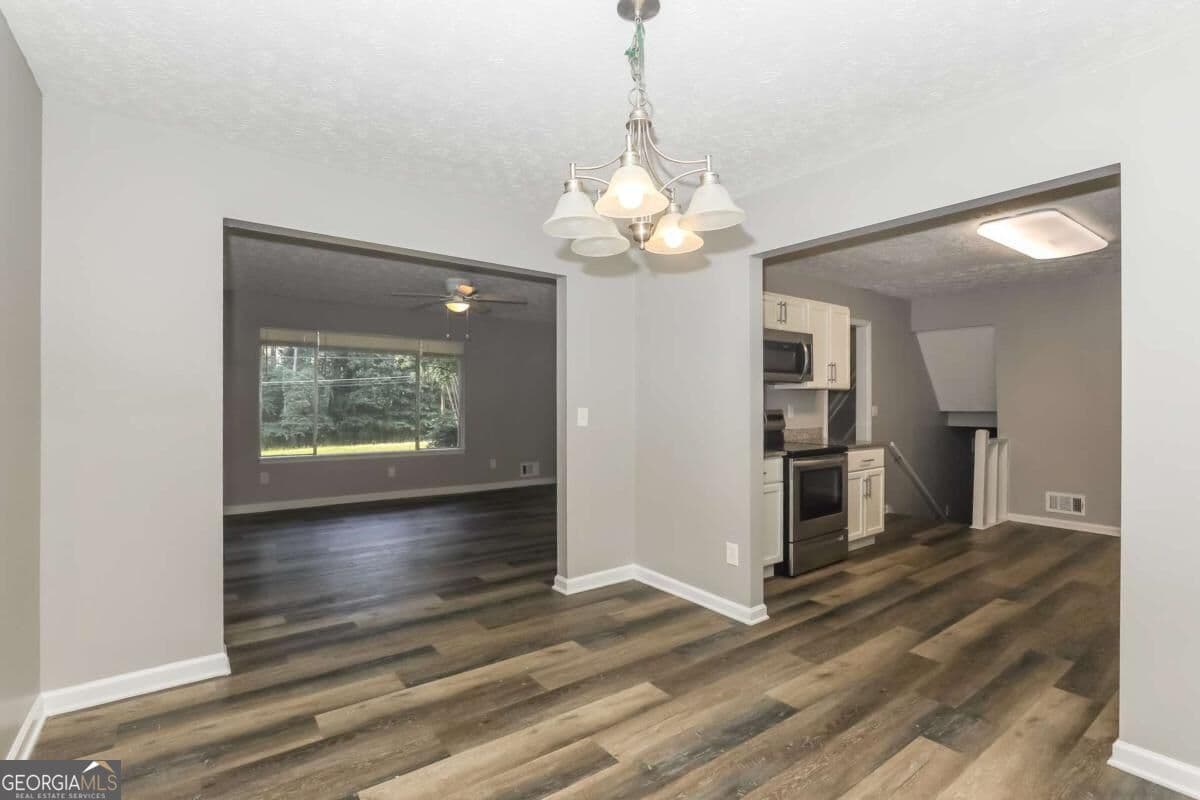 4 bedroom, 2.5 bathroom, 2,352 sq ft single family residence for sale at 2734 Noahs Ark Road, Jonesboro, GA 30236 — photo 5