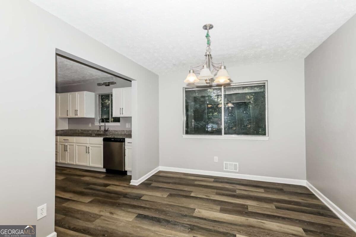 4 bedroom, 2.5 bathroom, 2,352 sq ft single family residence for sale at 2734 Noahs Ark Road, Jonesboro, GA 30236 — photo 4