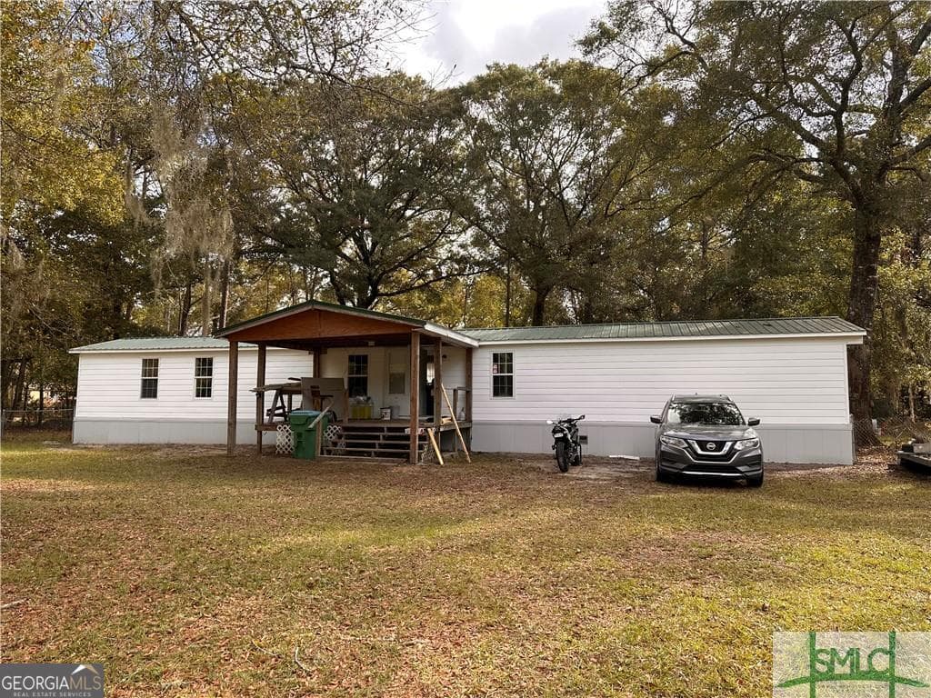 5 bedroom, 4 bathroom manufactured home,mixed use for sale at 219 & 221 John Carter Road, Bloomingdale, GA 31302