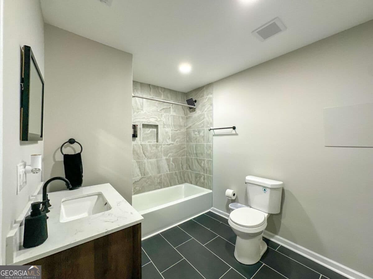 5 bedroom, 3.5 bathroom, 2,180 sq ft single family residence for sale at 2376 Melinda Drive, Atlanta, GA 30345 — photo 4