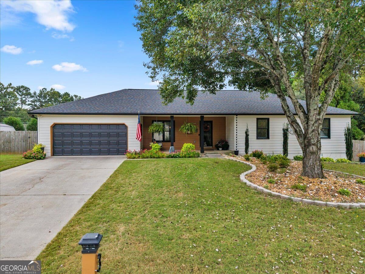 3 bedroom, 2 bathroom, 1,800 sq ft single family residence for sale at 3385 Hudson Lane, Loganville, GA 30052 — photo 1 of 24