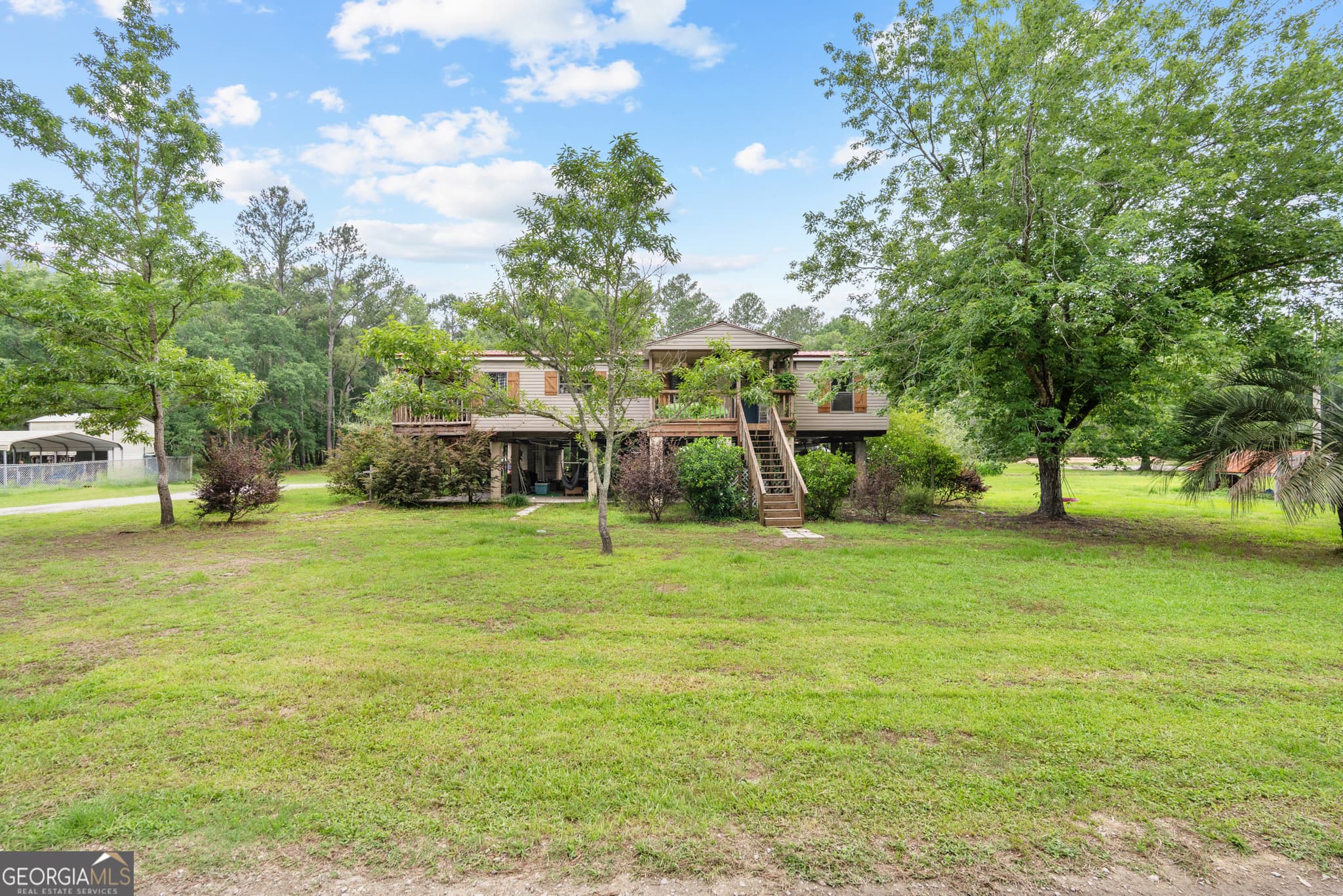 4 bedroom, 4.5 bathroom, 3,284 sq ft single family residence for sale at 67 Lagoon Road, Statesboro, GA 30461 — photo 3