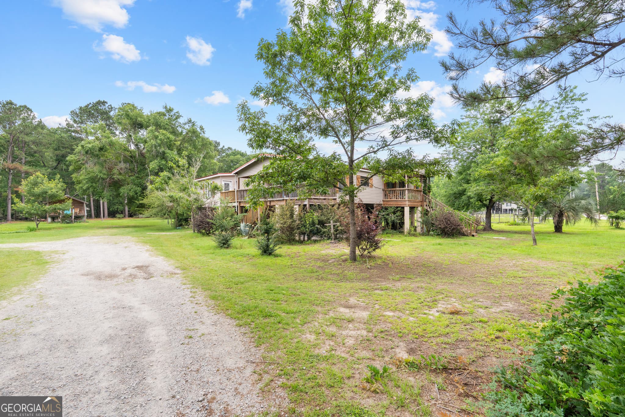 4 bedroom, 4.5 bathroom, 3,284 sq ft single family residence for sale at 67 Lagoon Road, Statesboro, GA 30461 — photo 4