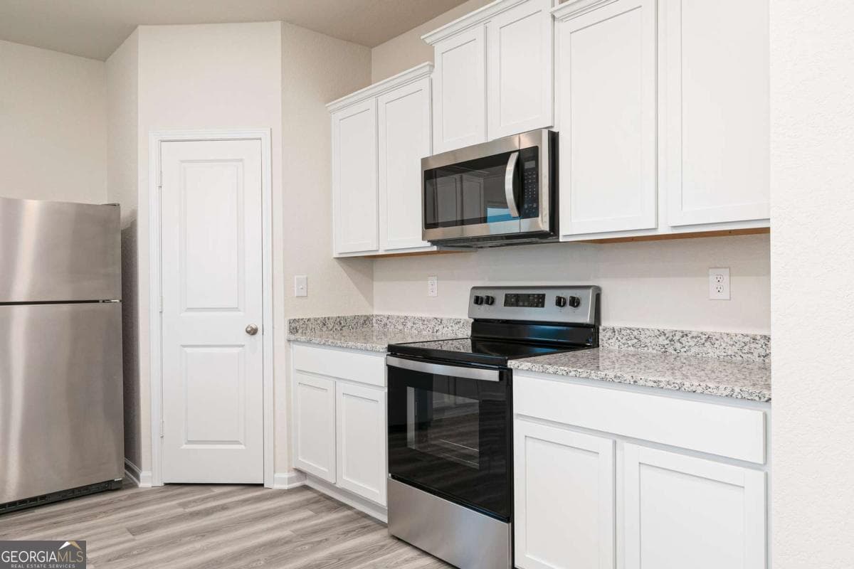 3 bedroom, 2.5 bathroom, 1,680 sq ft single family residence for sale at 110 Howell Drive, Villa Rica, GA 30180 — photo 7