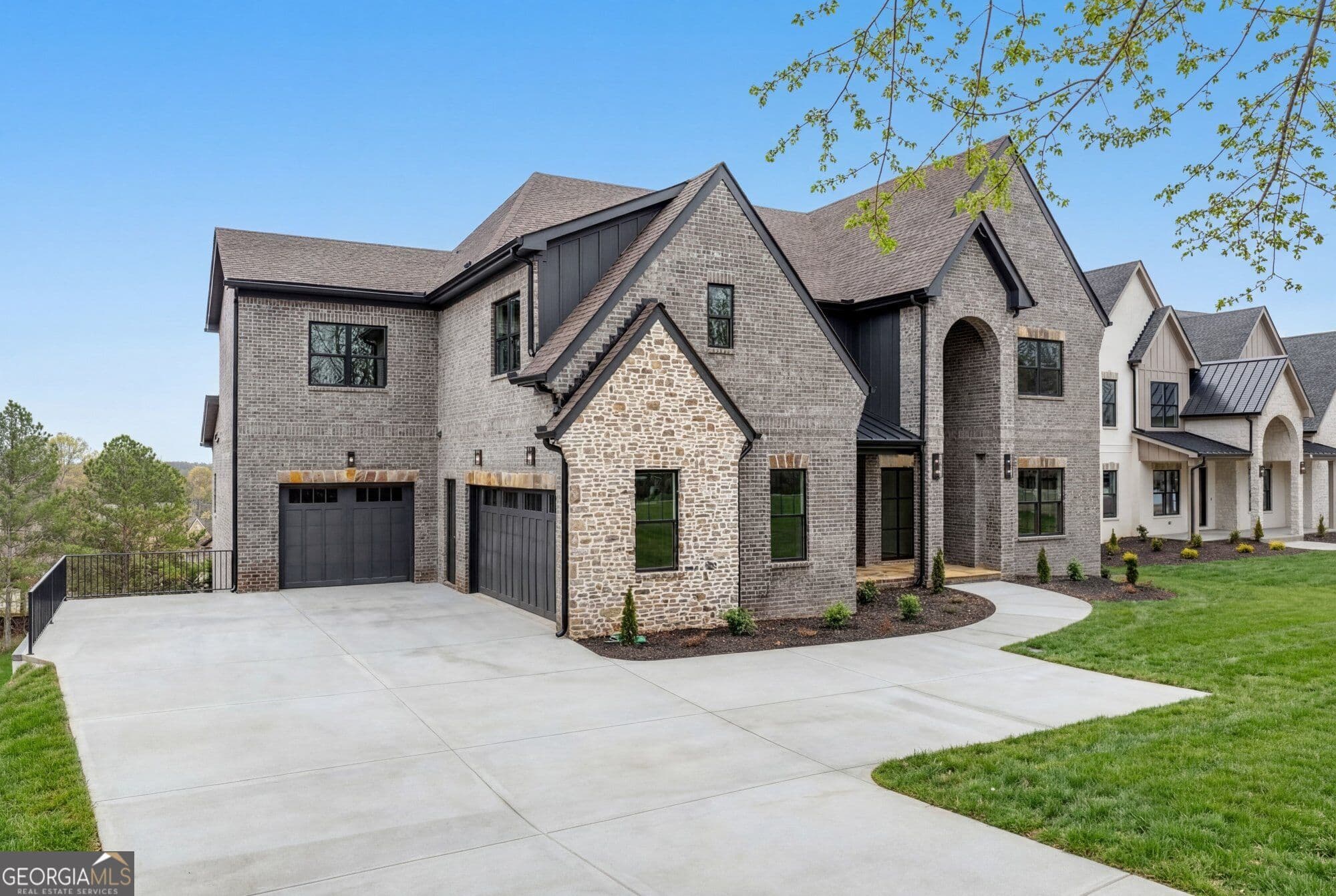 5 bedroom, 4.5 bathroom, 5,517 sq ft single family residence for sale at 3267 N Bogan Road, Buford, GA 30519 — photo 2