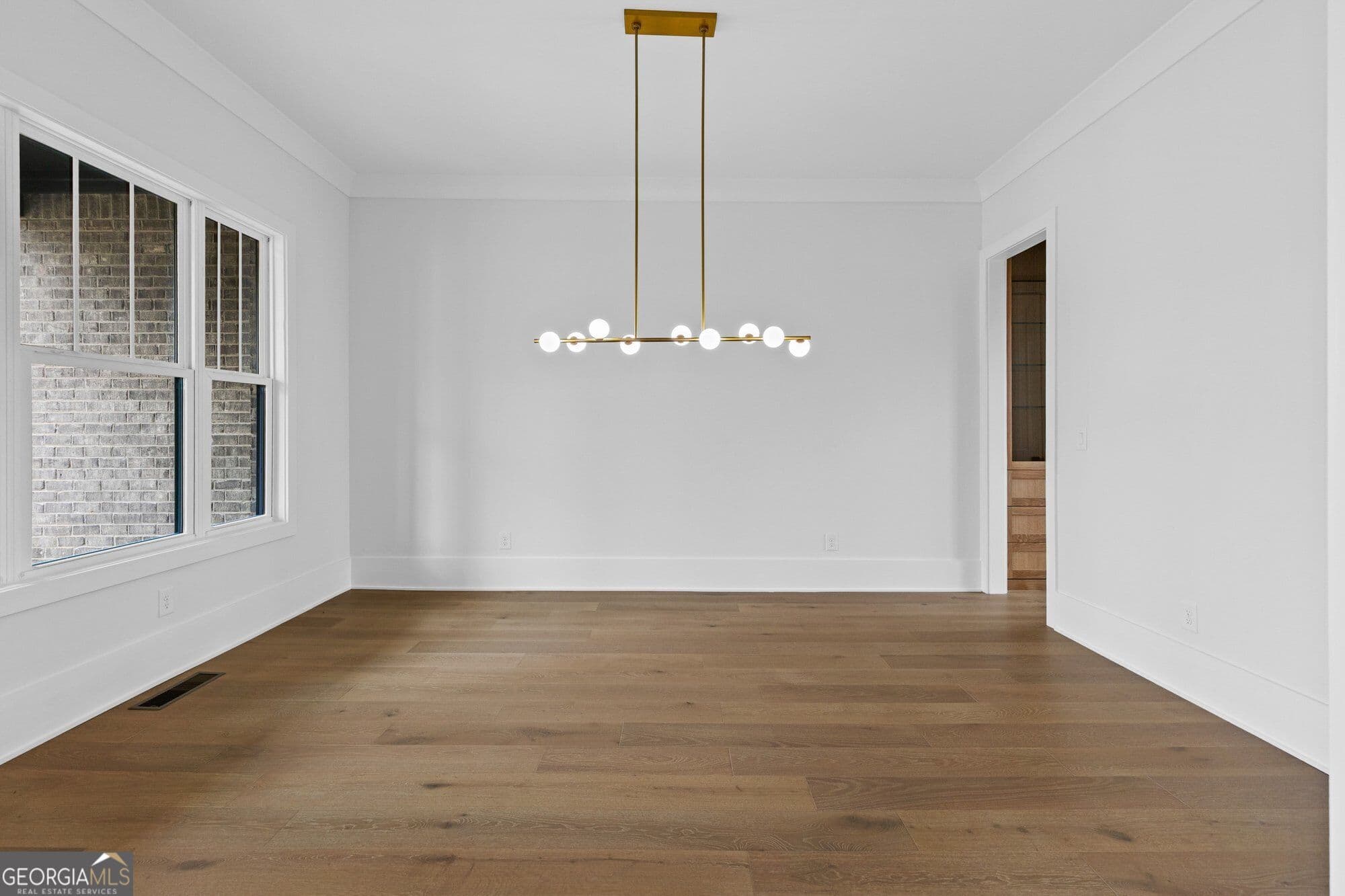 5 bedroom, 4.5 bathroom, 5,517 sq ft single family residence for sale at 3267 N Bogan Road, Buford, GA 30519 — photo 6