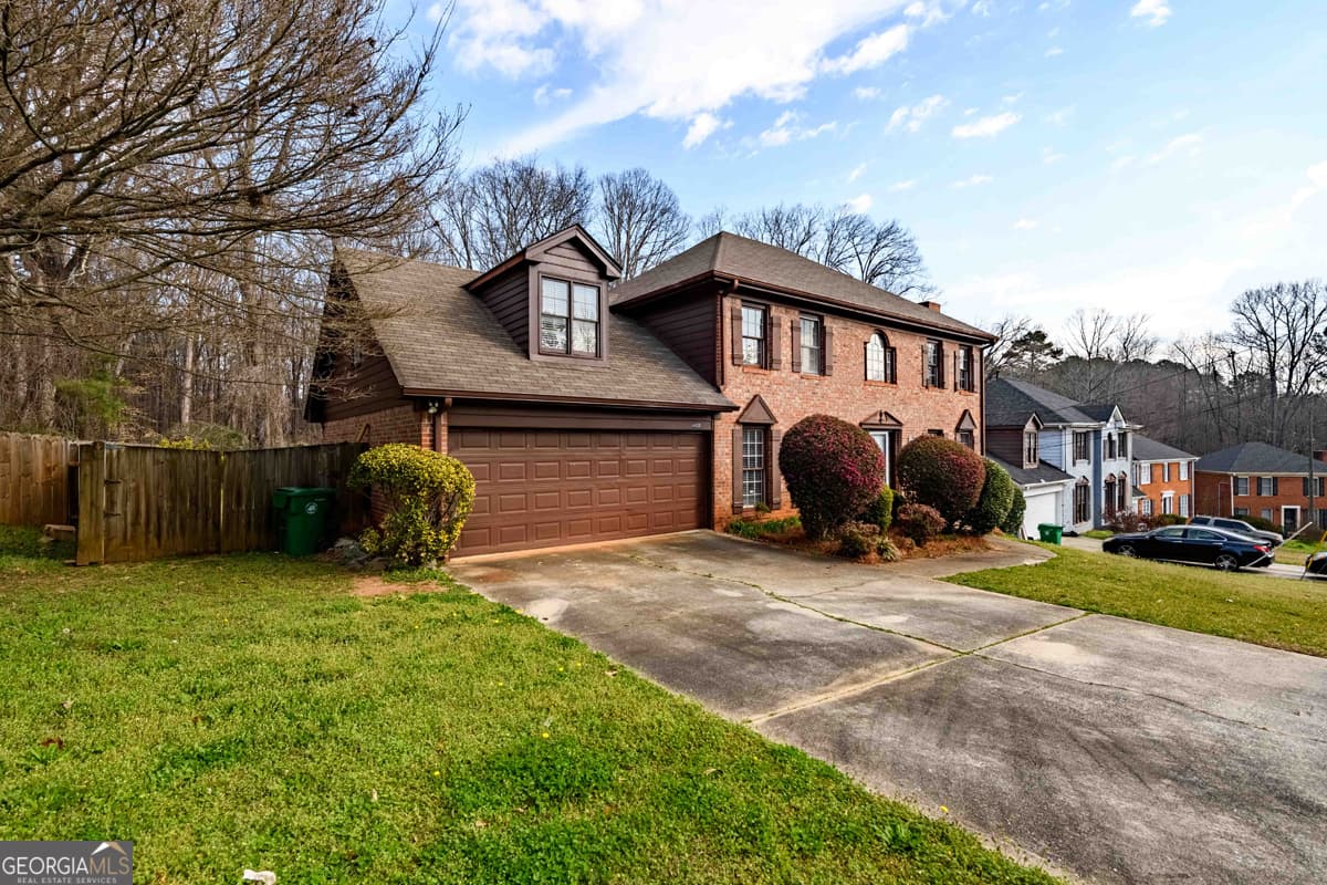 4 bedroom, 2.5 bathroom, 2,805 sq ft single family residence for sale at 6420 Phillips Place, Lithonia, GA 30058 — photo 2