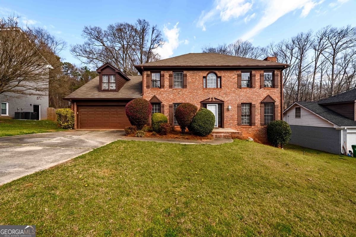 4 bedroom, 2.5 bathroom, 2,805 sq ft single family residence for sale at 6420 Phillips Place, Lithonia, GA 30058 — photo 1 of 40