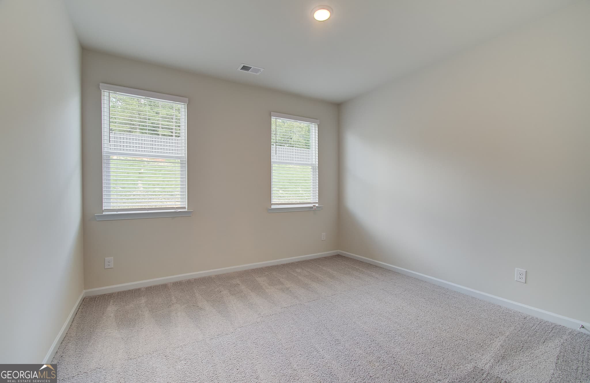 5 bedroom, 4 bathroom, 3,167 sq ft single family residence for sale at 1059 Georgian Point Drive LOT 85, Lawrenceville, GA 30045 — photo 9