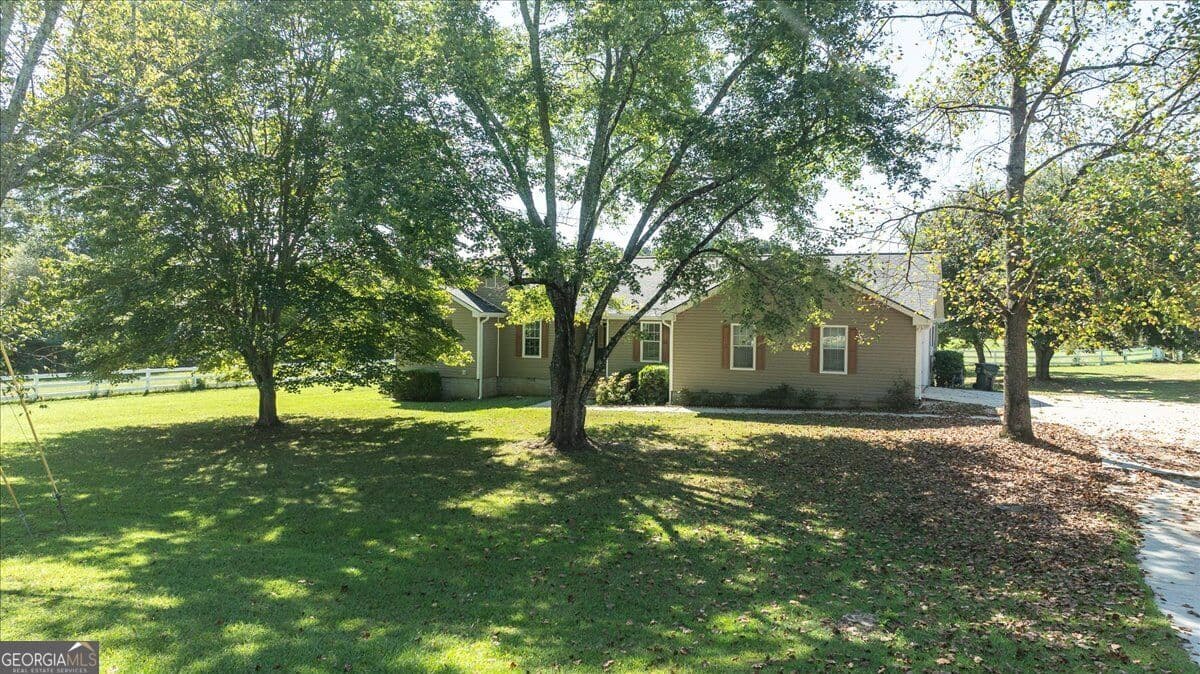 4 bedroom, 2 bathroom, 2,001 sq ft single family residence for sale at 358 Roscoe Davis Road, Monroe, GA 30656 — photo 2