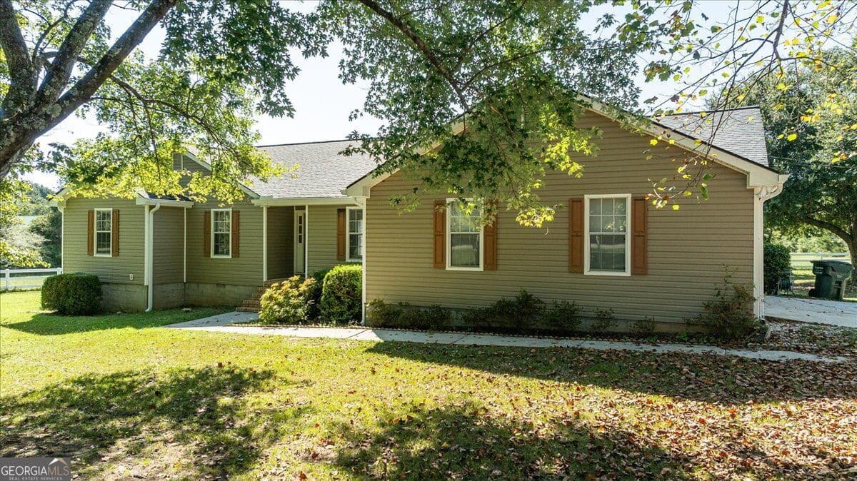4 bedroom, 2 bathroom, 2,001 sq ft single family residence for sale at 358 Roscoe Davis Road, Monroe, GA 30656