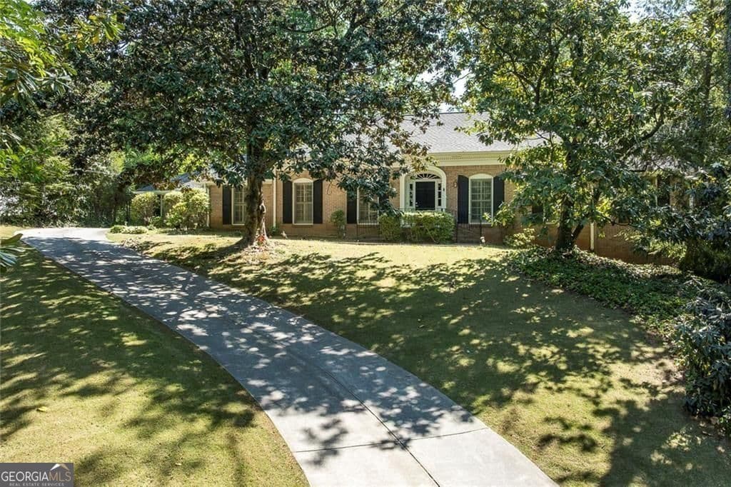 5 bedroom, 4 bathroom, 5,088 sq ft single family residence sold at 6095 River Shore Parkway, Sandy Springs, GA 30328