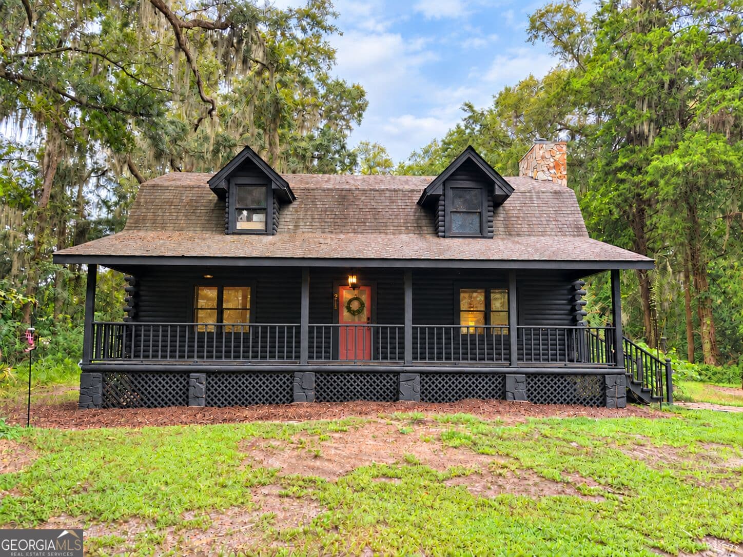4 bedroom, 3 bathroom, 1,626 sq ft cabin,single family residence for sale at 215 Hendricks Lane, Brunswick, GA 31520 — photo 1 of 48