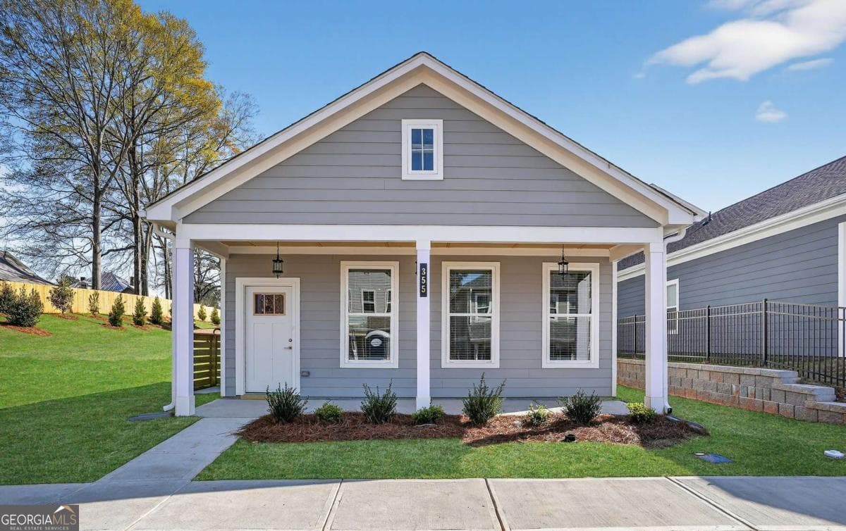 1 bedroom, 1 bathroom, 792 sq ft single family residence for sale at 355 Dempsey Drive LOT 16, Fayetteville, GA 30214 — photo 1 of 21