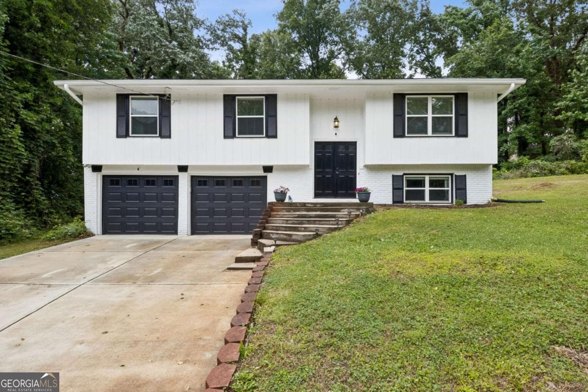 4 bedroom, 2.5 bathroom single family residence sold at 1042 Mountain Woods Court, Stone Mountain, GA 30087