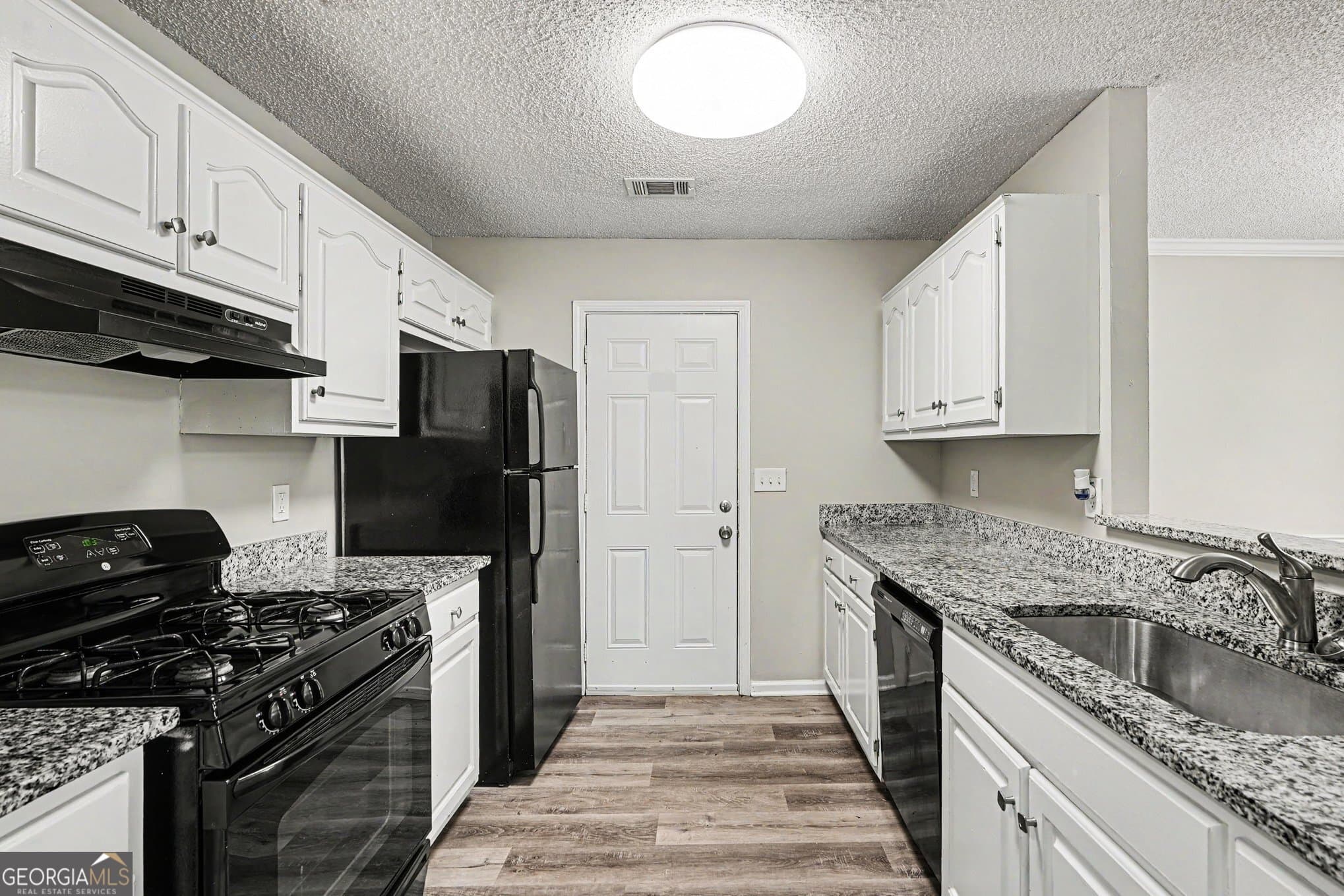 3 bedroom, 2 bathroom, 1,104 sq ft single family residence for sale at 1382 N Hampton Drive, Hampton, GA 30228 — photo 6